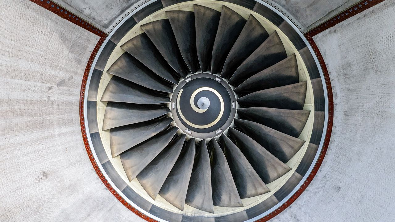 The fan of a jet engine seen head-on at the gate